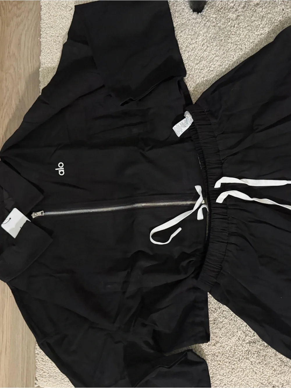 ALO Yoga Black Cropped Jacket and Skirt Set with White Drawstrings